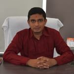 Dr.AshishVekaria - Dentist, Rajkot